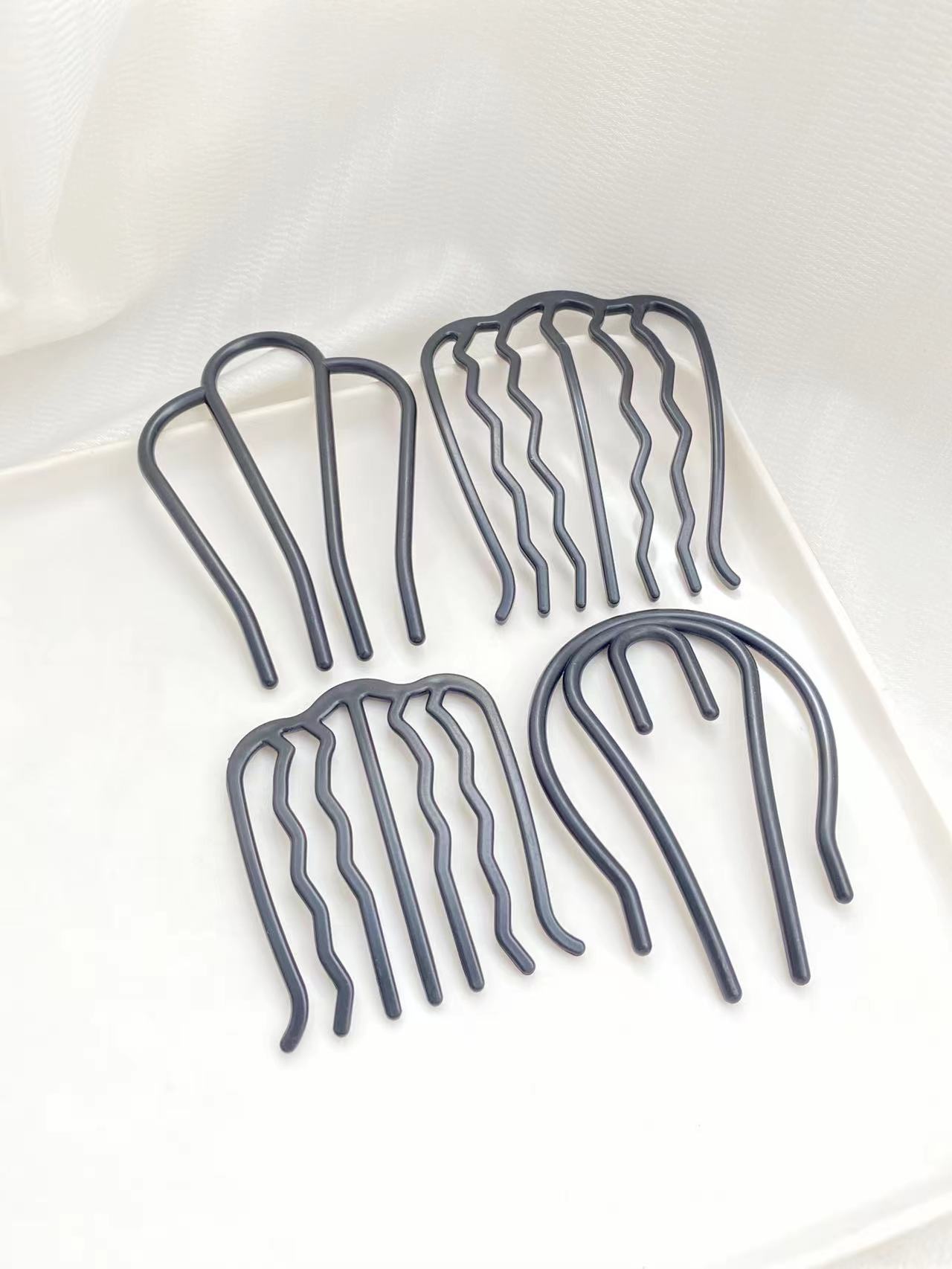 Women Accessories Shop - 4 stuks zwarte haarkammen met verschillende